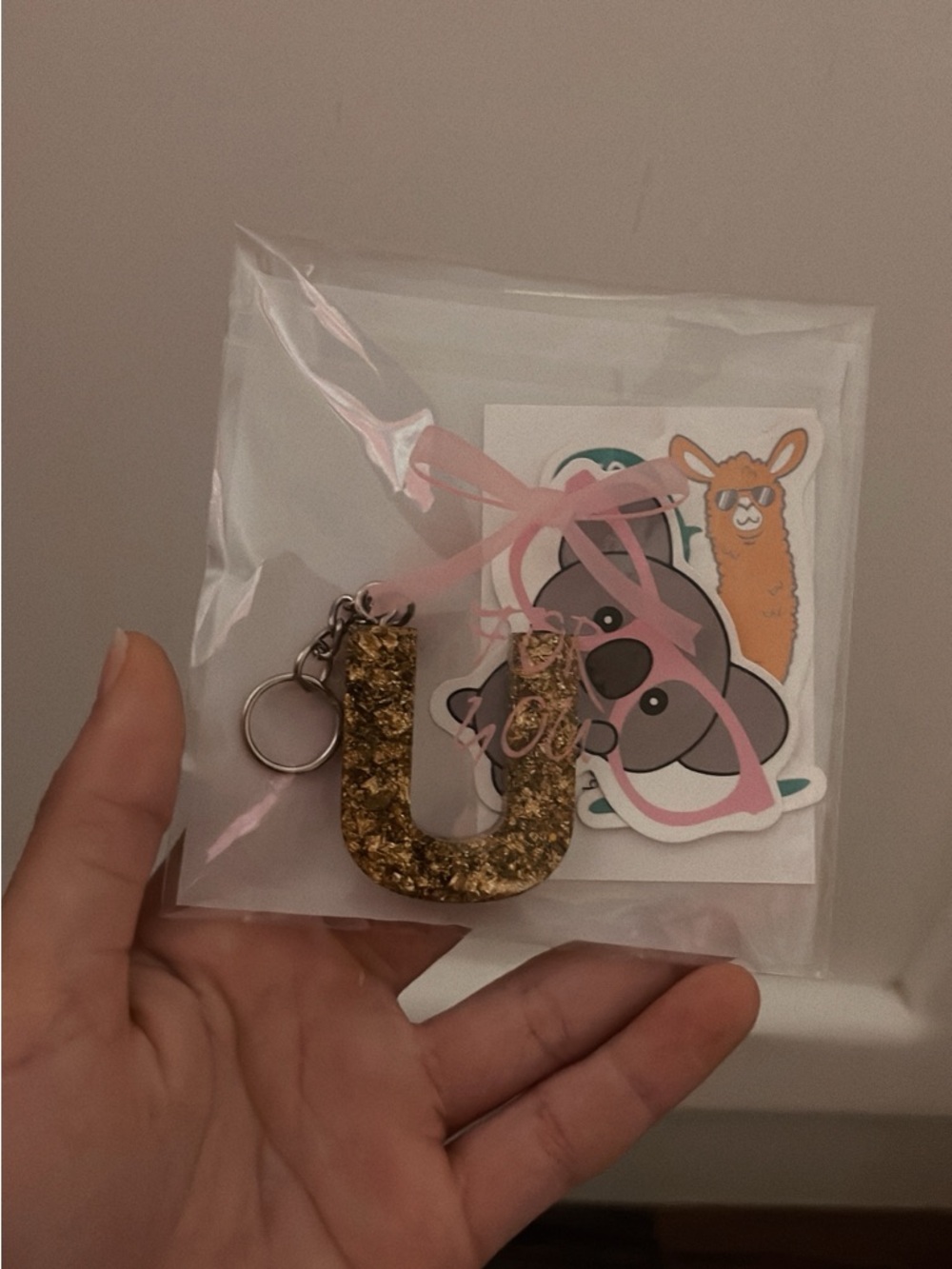 Gold Flake Resin Letter U Keychain with Pink Ribbon